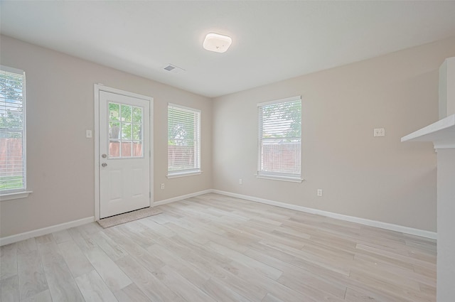 16502 N Glade Dr, Houston, TX 77073 - unfurnished room with healthy amount of natural light, light wood-style floors, and baseboards