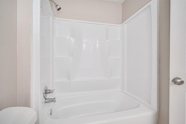 16502 N Glade Dr, Houston, TX 77073 - bathroom with toilet and tub / shower combination