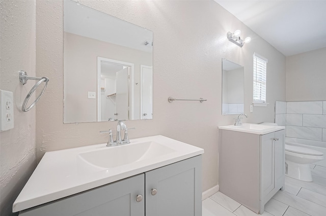 16502 N Glade Dr, Houston, TX 77073 - bathroom with vanity, toilet, and tile patterned flooring
