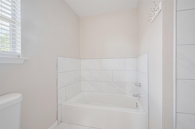 16502 N Glade Dr, Houston, TX 77073 - full bathroom featuring a bath, toilet, and tile patterned floors