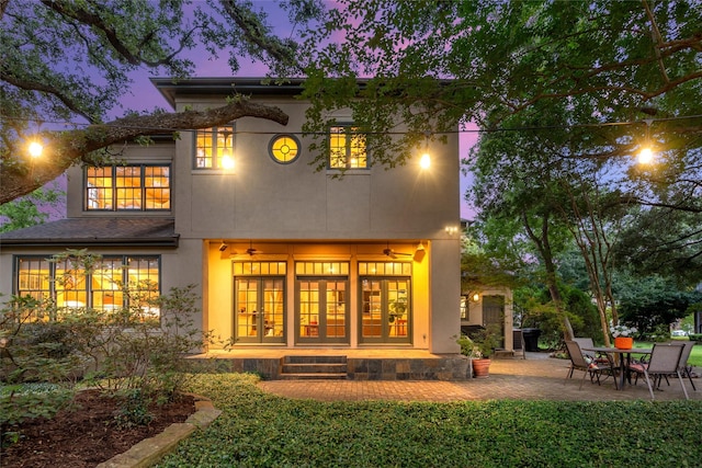 3502 Underwood St, Houston, TX 77025 - rear view of property featuring french doors, stucco siding, and a patio area