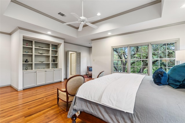 3502 Underwood St, Houston, TX 77025 - bedroom featuring ornamental molding, recessed lighting, light wood-style flooring, a tray ceiling, and ceiling fan