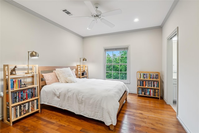 3502 Underwood St, Houston, TX 77025 - bedroom featuring crown molding, wood finished floors, recessed lighting, and a ceiling fan