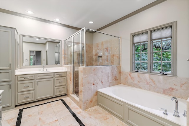 3502 Underwood St, Houston, TX 77025 - bathroom with crown molding, a garden tub, vanity, a stall shower, and inlaid floor details