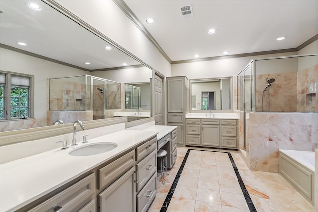 3502 Underwood St, Houston, TX 77025 - bathroom featuring ornamental molding, a shower stall, two vanities, a bath, and recessed lighting