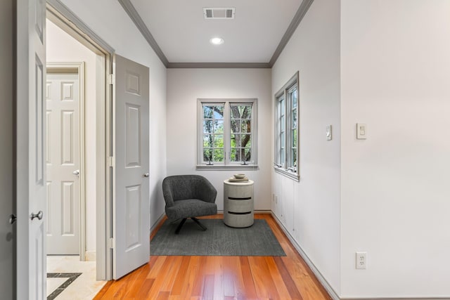 3502 Underwood St, Houston, TX 77025 - sitting room featuring crown molding, light wood-type flooring, and recessed lighting