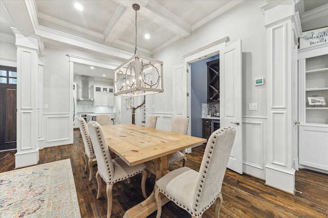 412 W 24th St, Houston, TX 77008 - dining room featuring ornate columns, dark wood finished floors, a decorative wall, ornamental molding, and beam ceiling