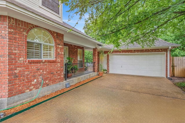 3008 Cochise Ct, College Station, TX 77845 - view of property exterior featuring driveway, brick siding, a garage, and roof with shingles