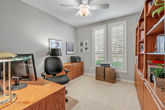 3008 Cochise Ct, College Station, TX 77845 - office area featuring a ceiling fan, light carpet, and baseboards