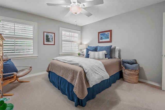 3008 Cochise Ct, College Station, TX 77845 - carpeted bedroom with baseboards and ceiling fan
