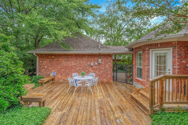 3008 Cochise Ct, College Station, TX 77845 - wooden terrace with outdoor dining area