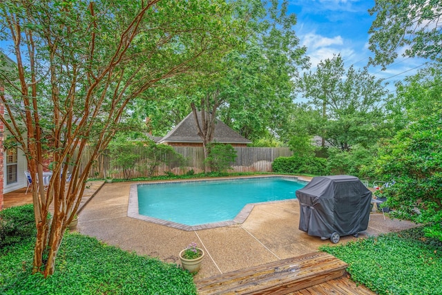 3008 Cochise Ct, College Station, TX 77845 - view of pool with a fenced backyard, area for grilling, a wooden deck, and a patio