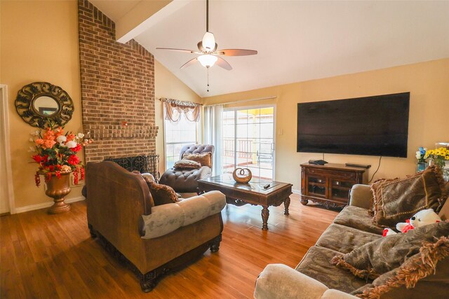 13555 Portobello Dr, Houston, TX 77083 - living room featuring ceiling fan, beam ceiling, wood finished floors, baseboards, and high vaulted ceiling