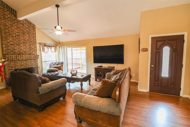 13555 Portobello Dr, Houston, TX 77083 - living area with a ceiling fan, wood finished floors, a fireplace, and baseboards