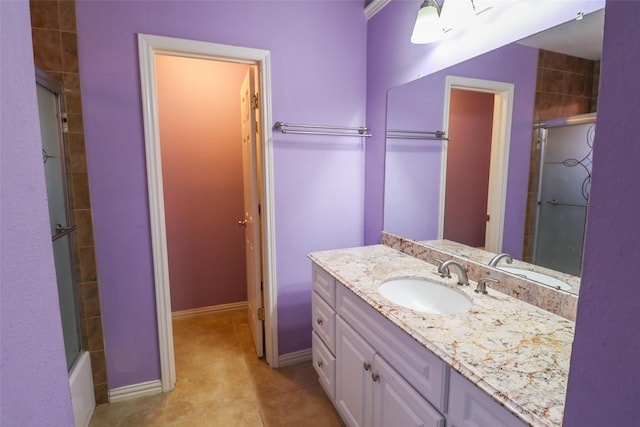 13555 Portobello Dr, Houston, TX 77083 - full bathroom with vanity, tile patterned floors, and baseboards