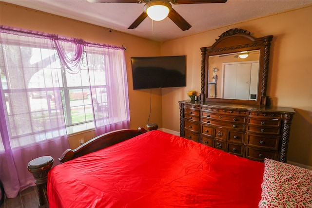13555 Portobello Dr, Houston, TX 77083 - bedroom with ceiling fan and wood finished floors