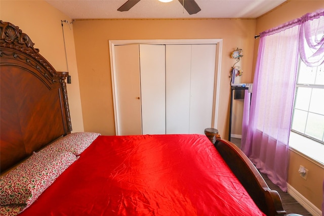 13555 Portobello Dr, Houston, TX 77083 - bedroom with a closet, multiple windows, baseboards, and ceiling fan