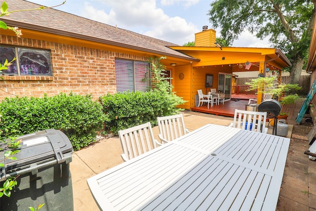 13555 Portobello Dr, Houston, TX 77083 - deck featuring outdoor dining space and a patio