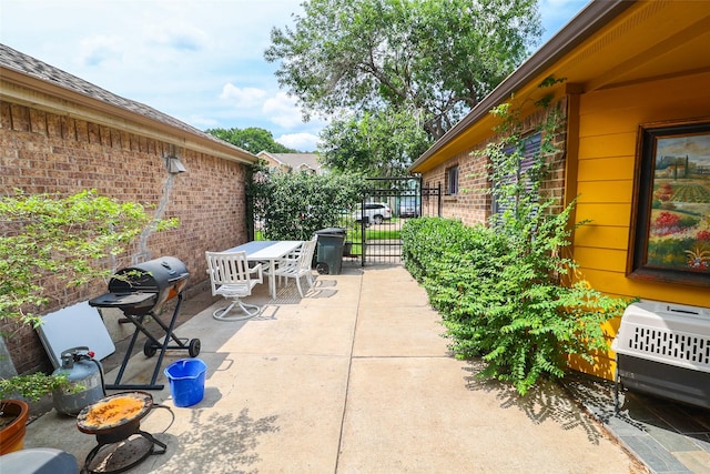 13555 Portobello Dr, Houston, TX 77083 - view of patio with outdoor dining area and area for grilling