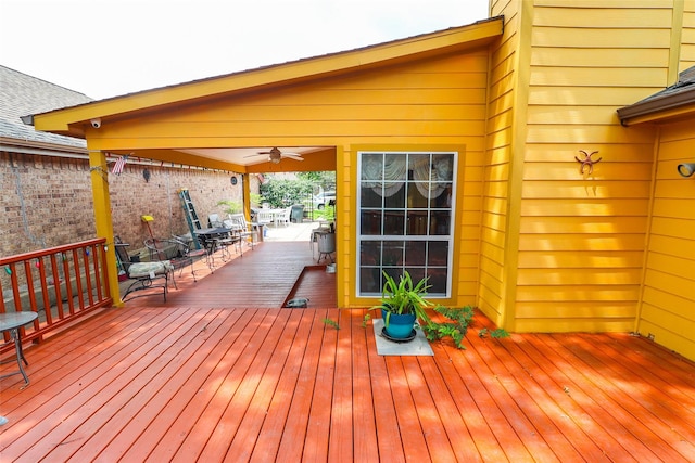 13555 Portobello Dr, Houston, TX 77083 - deck with outdoor dining space and ceiling fan