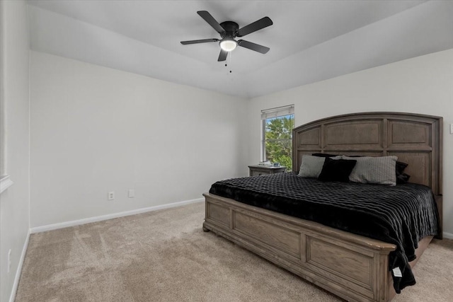 8731 Majesticbrook Dr, Houston, TX 77095 - bedroom with light colored carpet, baseboards, and ceiling fan