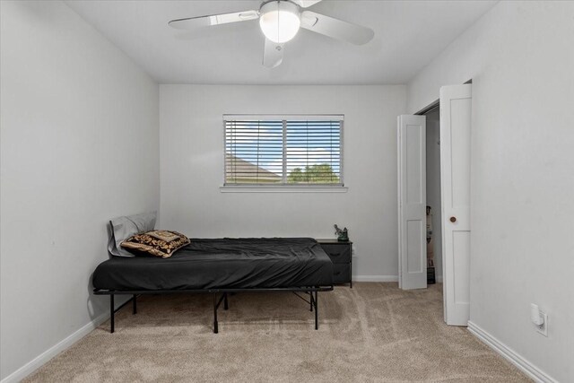 8731 Majesticbrook Dr, Houston, TX 77095 - bedroom featuring carpet, baseboards, and a ceiling fan