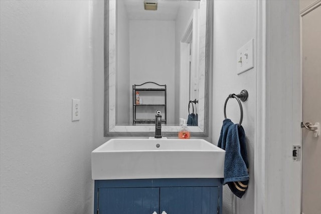 8731 Majesticbrook Dr, Houston, TX 77095 - bathroom featuring vanity and a textured wall