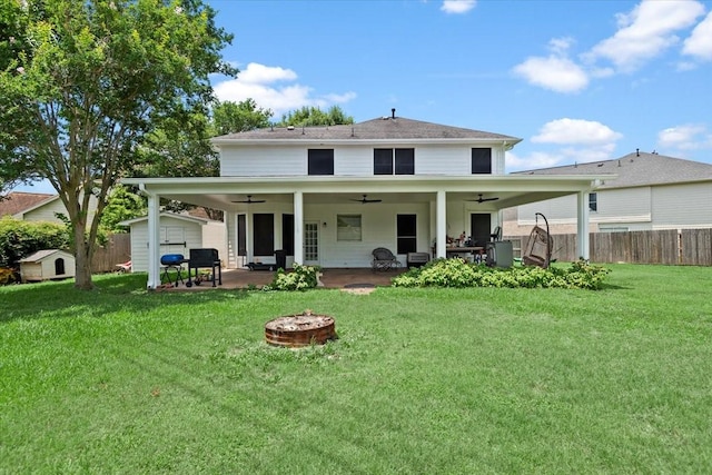 8731 Majesticbrook Dr, Houston, TX 77095 - rear view of property with an outdoor fire pit, ceiling fan, and a patio area