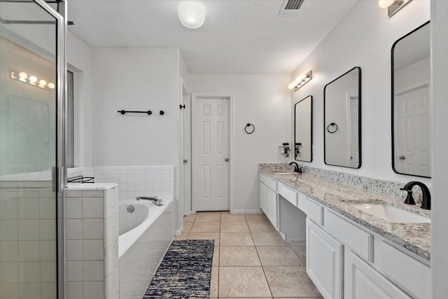 8731 Majesticbrook Dr, Houston, TX 77095 - bathroom featuring double vanity, a bath, tile patterned floors, an enclosed shower, and baseboards