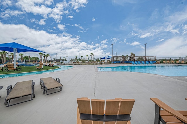 1214 Red Hills Dr, Rosharon, TX 77583 - community pool featuring a patio area
