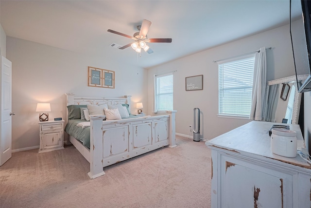 1214 Red Hills Dr, Rosharon, TX 77583 - bedroom with light carpet, baseboards, and a ceiling fan