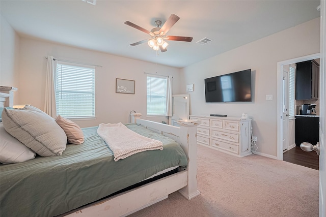 1214 Red Hills Dr, Rosharon, TX 77583 - carpeted bedroom with ceiling fan and baseboards