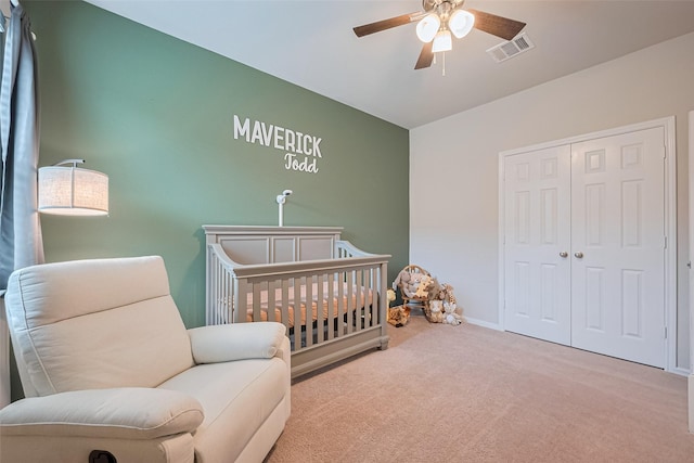 1214 Red Hills Dr, Rosharon, TX 77583 - carpeted bedroom with a closet, baseboards, ceiling fan, and a crib