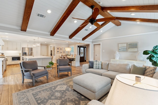 2502 Briarbrook Dr, Houston, TX 77042 - living room featuring light wood finished floors, a chandelier, recessed lighting, and a ceiling fan
