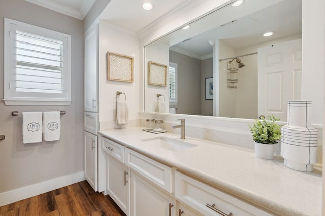 2502 Briarbrook Dr, Houston, TX 77042 - full bath featuring ornamental molding, vanity, a shower, wood finished floors, and recessed lighting