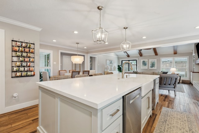 2502 Briarbrook Dr, Houston, TX 77042 - kitchen with stainless steel dishwasher, open floor plan, a chandelier, baseboards, and recessed lighting