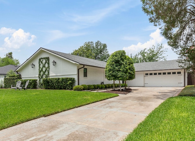 2502 Briarbrook Dr, Houston, TX 77042 - view of front of property featuring driveway, a front yard, and roof with shingles
