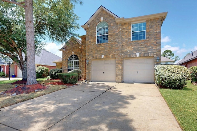 3606 Kilgore Ct, Manvel, TX 77578 - traditional-style house with driveway, a garage, and brick siding