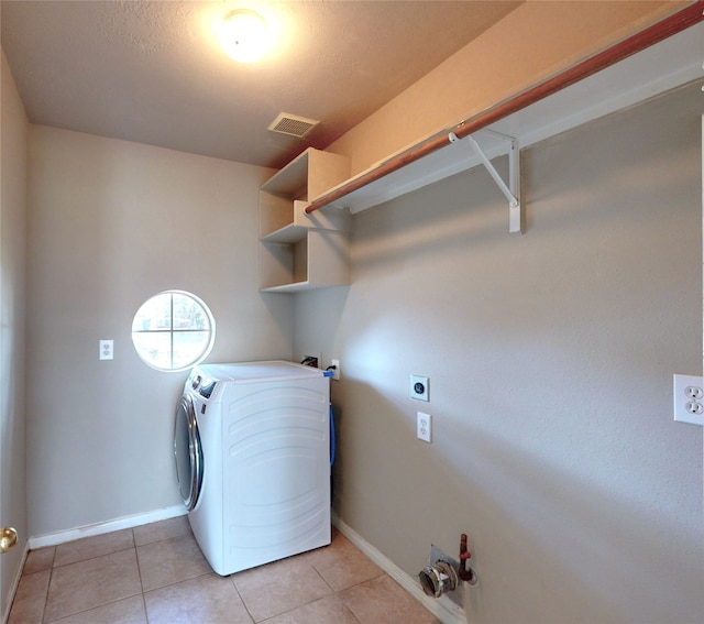 3606 Kilgore Ct, Manvel, TX 77578 - washroom featuring washer / dryer, baseboards, and light tile patterned floors