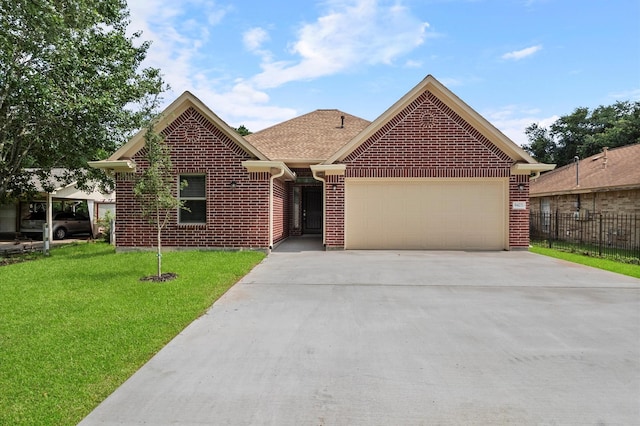 8423 Holiday Ln, Houston, TX 77075 - view of front of home with a garage, concrete driveway, brick siding, and roof with shingles