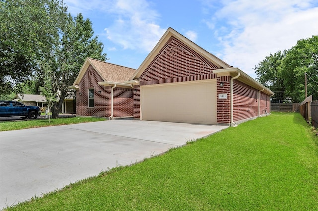 8423 Holiday Ln, Houston, TX 77075 - view of front of home with brick siding, concrete driveway, and a garage