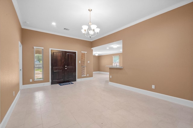 8423 Holiday Ln, Houston, TX 77075 - foyer with a chandelier, crown molding, baseboards, and recessed lighting