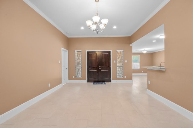 8423 Holiday Ln, Houston, TX 77075 - foyer with crown molding, a chandelier, recessed lighting, and baseboards