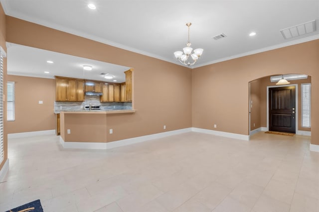 8423 Holiday Ln, Houston, TX 77075 - unfurnished living room featuring ornamental molding, arched walkways, a chandelier, recessed lighting, and baseboards