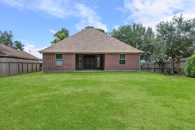 8423 Holiday Ln, Houston, TX 77075 - rear view of house with a shingled roof and brick siding