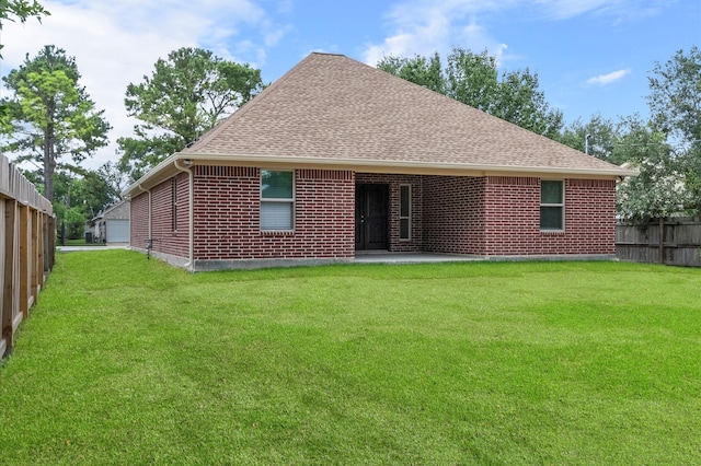 8423 Holiday Ln, Houston, TX 77075 - rear view of property featuring roof with shingles and brick siding