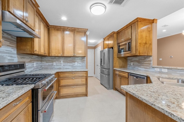 8423 Holiday Ln, Houston, TX 77075 - kitchen with stainless steel appliances, exhaust hood, ornamental molding, light stone counters, and decorative backsplash