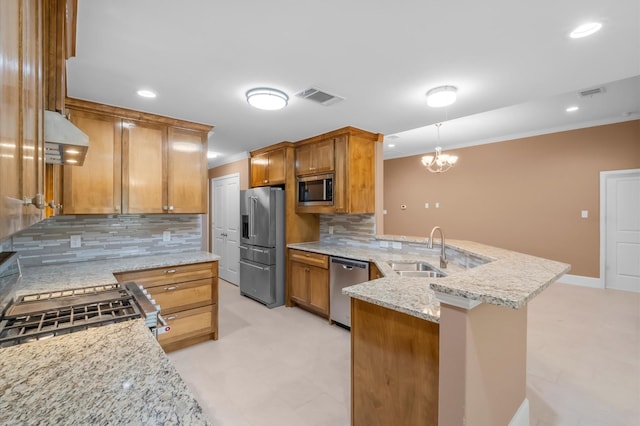 8423 Holiday Ln, Houston, TX 77075 - kitchen featuring stainless steel appliances, a sink, a peninsula, crown molding, and tasteful backsplash