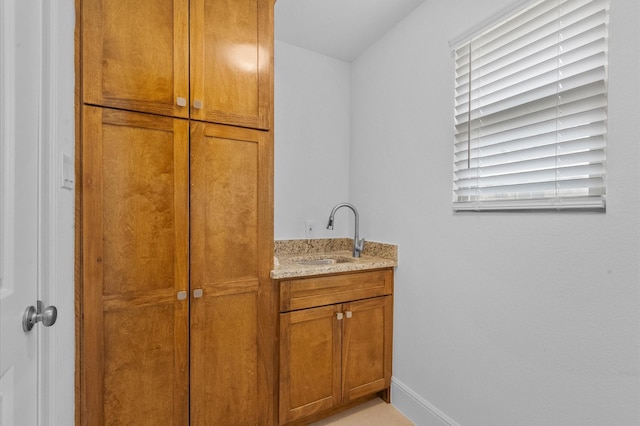 8423 Holiday Ln, Houston, TX 77075 - bathroom featuring vanity and baseboards