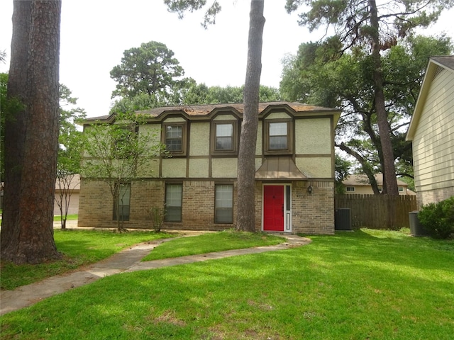 4810 Theall Rd, Houston, TX 77066 - tudor home with stucco siding, brick siding, and cooling unit
